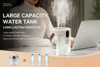 Cool mist humidifier in operation, three nozzle mist output on bedroom nightstand
